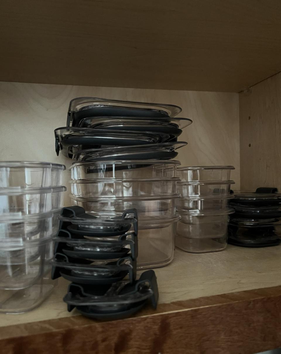 storage containers in cupboard