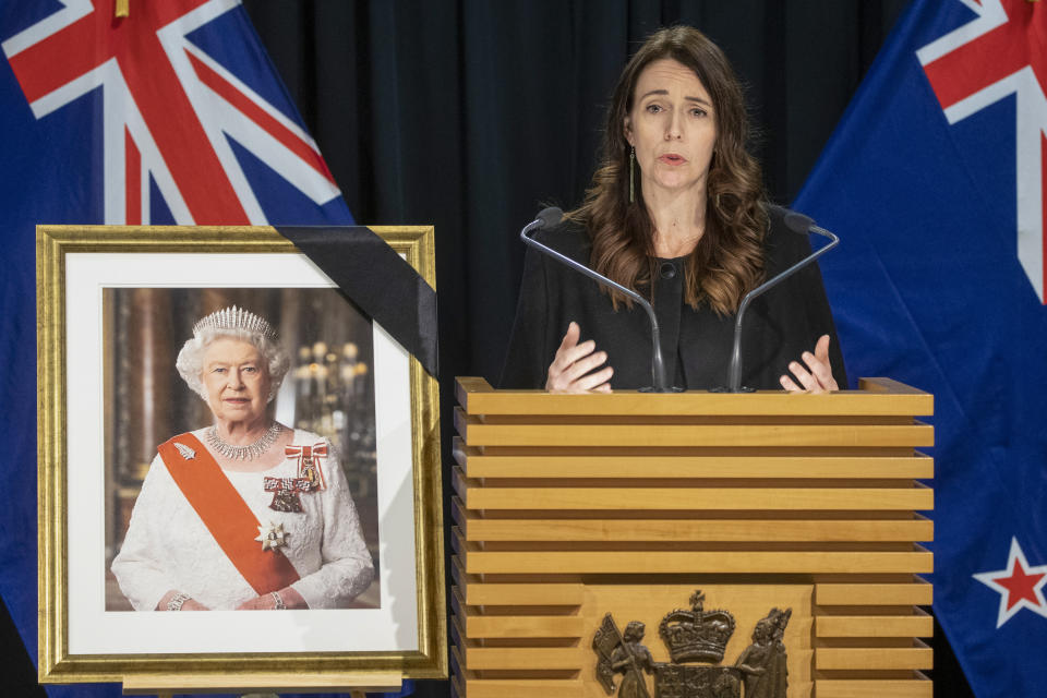 New Zealand Prime Minister Jacinda Ardern addresses a press conference after the news of the passing of Queen Elizabeth II at the Beehive in Wellington, New Zealand, Friday, Sept. 9, 2022. Queen Elizabeth II, Britain's longest-reigning monarch and a rock of stability in a turbulent era for her country and the world, died Thursday after 70 years on the throne. She was 96. (Mark Mitchell/New Zealand Herald via AP)