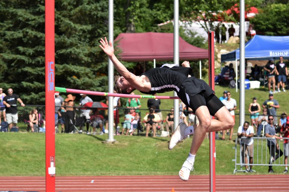 Kannon Chase soars while competing in the high jump at the 2022 IHSAA Boys' Track and Field State Finals.