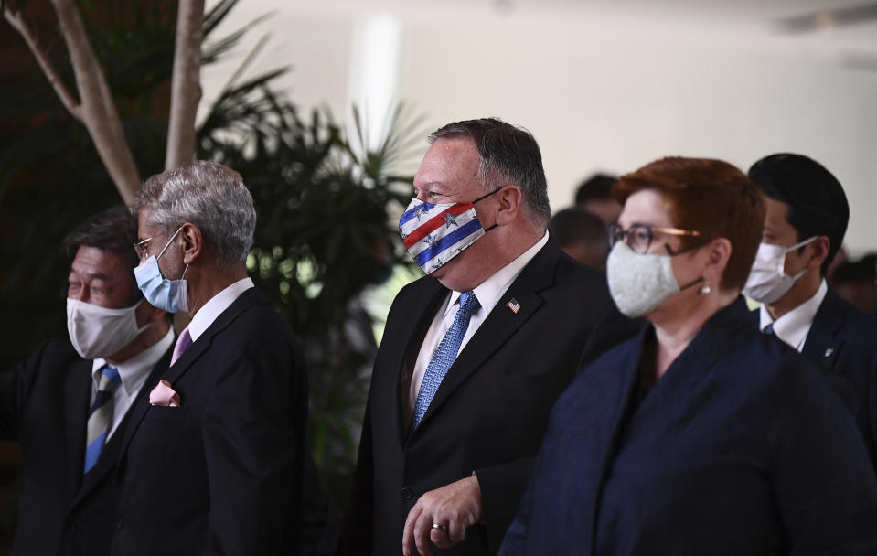 From left; Japan's Foreign Minister Toshimitsu Motegi, Indian Foreign Minister Subrahmanyam Jaishankar, U.S. Secretary of State Mike Pompeo and Australia's Foreign Minister Marise Payne leave prime minister's office following a meeting in Tokyo, Tuesday, Oct. 6, 2020. (Charly Triballeau/Pool Photo via AP)