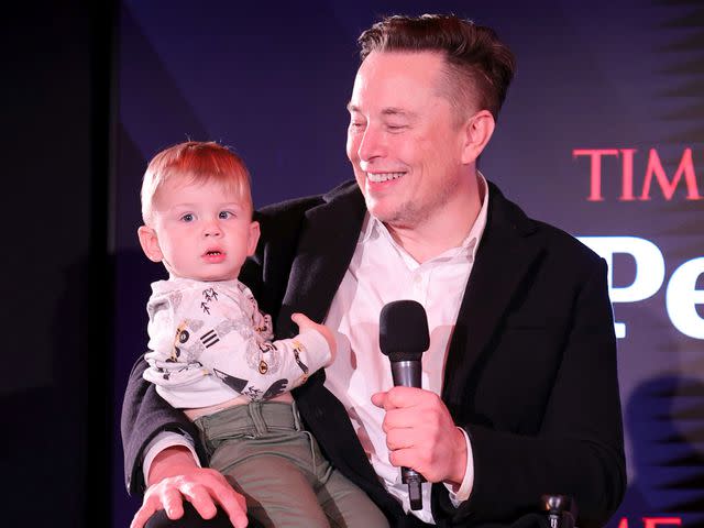 <p>Theo Wargo/Getty</p> Elon Musk and son X at TIME Person of the Year in 2021