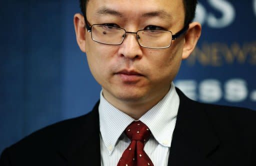 Chinese dissident author Yu Jie speaks during a press conference in Washington, DC. The prominent Chinese dissident who fled last week to the United States cautioned Wednesday over Beijing's influence in the world, saying that the communist state was bent on exporting its model