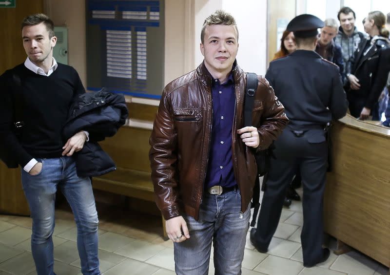 Opposition blogger and activist Roman Protasevich arrives for a court hearing in Minsk