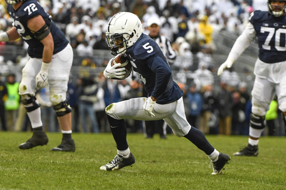 Penn State wide receiver Jahan Dotson (5) runs following a catch against Penn State during an NCAA college football game in State College, Pa.on Saturday, Nov. 13, 2021. (AP Photo/Barry Reeger)