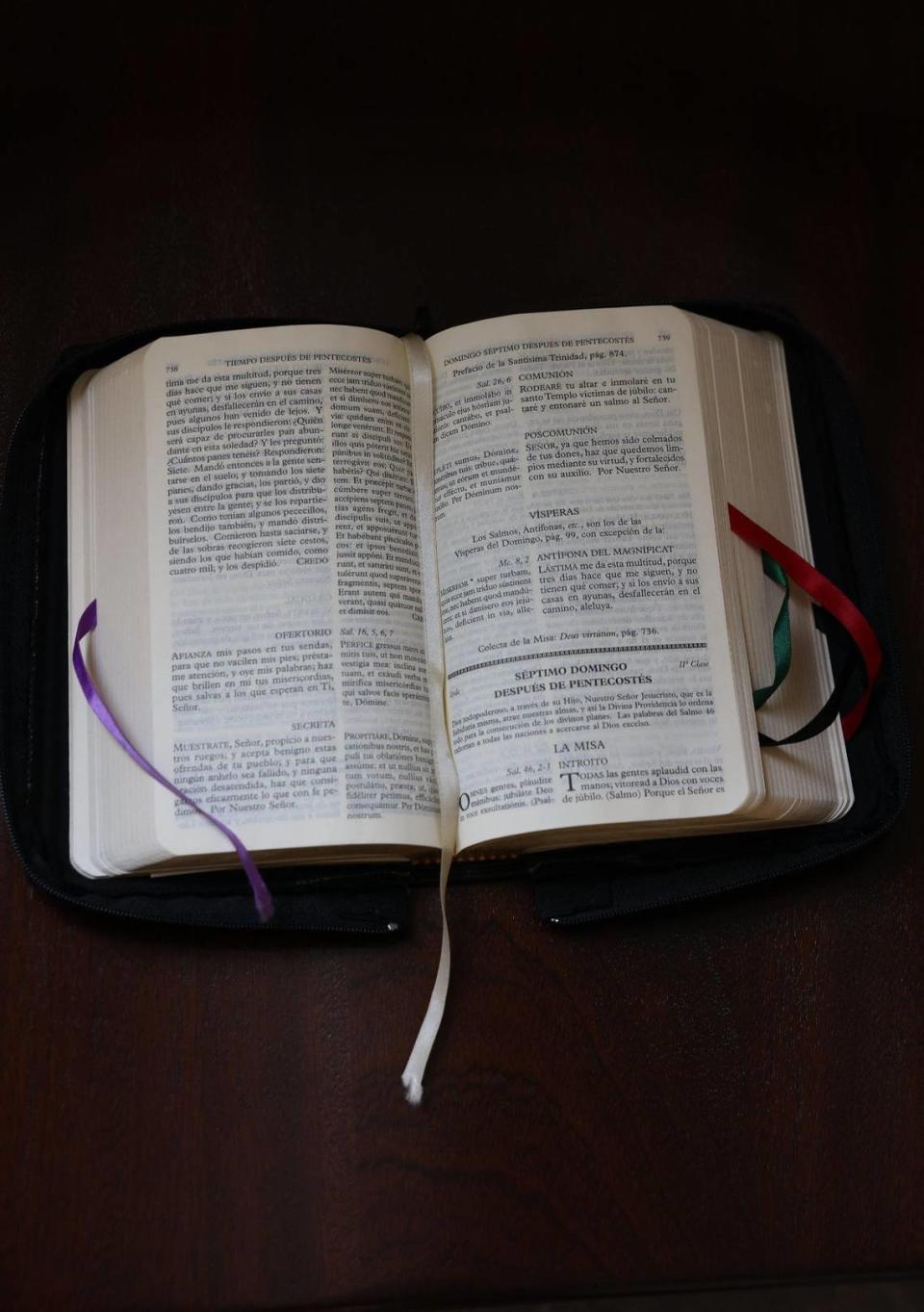 A missal, or the Church’s book of prayers and instructions for celebrating Mass, is in Latin and Spanish for worshipers who attended Sunday morning Latin mass at Our Lady of Belen Chapel. The religious service attracted young worshipers and families on Sunday, July 30, 2023.