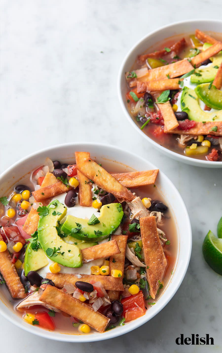 <p>We load this <a href="https://www.delish.com/cooking/recipe-ideas/recipes/a411/tortilla-soup-recipe/" rel="nofollow noopener" target="_blank" data-ylk="slk:tortilla soup;elm:context_link;itc:0;sec:content-canvas" class="link ">tortilla soup</a> up with extra protein by adding <a href="https://www.delish.com/cooking/g4252/best-black-bean-recipes/" rel="nofollow noopener" target="_blank" data-ylk="slk:black beans;elm:context_link;itc:0;sec:content-canvas" class="link ">black beans</a>, then throw in some vegetables (<a href="https://www.delish.com/cooking/g1463/sweet-corn-recipes/" rel="nofollow noopener" target="_blank" data-ylk="slk:corn;elm:context_link;itc:0;sec:content-canvas" class="link ">corn</a>! <a href="https://www.delish.com/cooking/recipe-ideas/g40327395/bell-pepper-recipes/" rel="nofollow noopener" target="_blank" data-ylk="slk:bell peppers;elm:context_link;itc:0;sec:content-canvas" class="link ">bell peppers</a>! <a href="https://www.delish.com/cooking/g39827053/onion-recipes/" rel="nofollow noopener" target="_blank" data-ylk="slk:onion;elm:context_link;itc:0;sec:content-canvas" class="link ">onion</a>!) for health and color, and flavor it all with canned fire-roasted tomatoes, which we love for their smokiness. We quick fry tortillas strips at the very end for added crunch, but feel free to just crumble some store-bought ones if you got 'em.</p><p>Get the <strong><a href="https://edit-delish.hearstapps.com/cooking/recipe-ideas/recipes/a51825/best-slow-cooker-chicken-tortilla-soup-recipe/" rel="nofollow noopener" target="_blank" data-ylk="slk:Slow-Cooker Chicken Tortilla Soup recipe;elm:context_link;itc:0;sec:content-canvas" class="link ">Slow-Cooker Chicken Tortilla Soup recipe</a>.</strong></p>