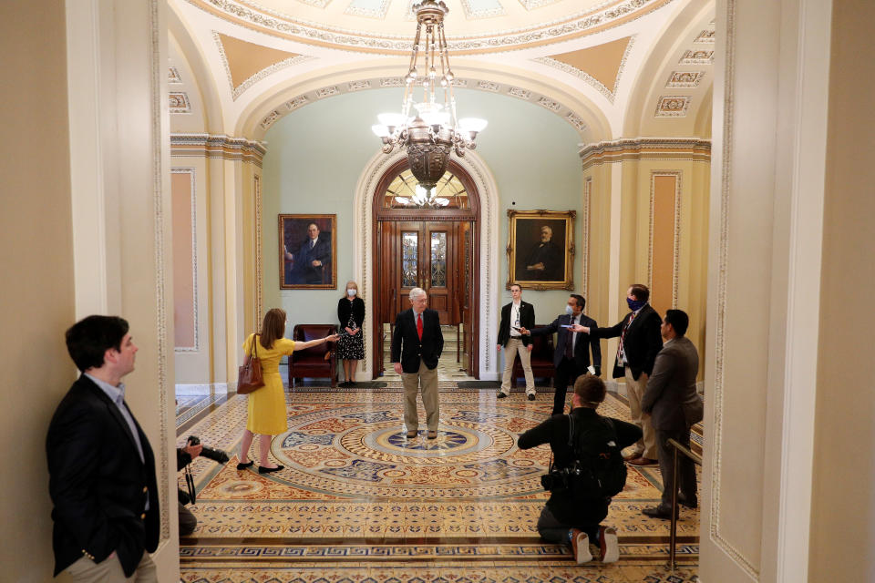 U.S. Senate Majority Leader Mitch McConnell (R-KY) speaks to members of the news media after departing from the Senate Chamber floor on Capitol Hill in Washington, D.C., April 9, 2020. REUTERS/Tom Brenner 