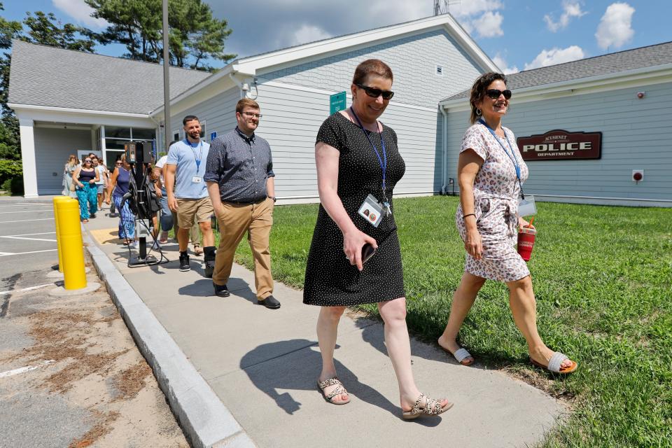Eighteen new Acushnet Public School teachers stop at the Acushnet Police Department building, during their multi-stop tour as part of their training and orientation.