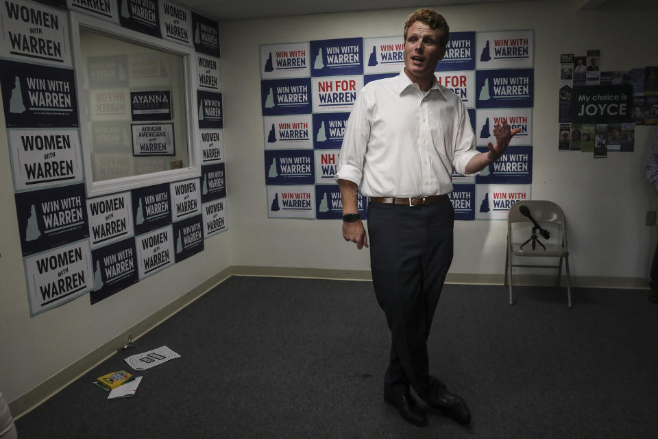 Rep. Joe Kennedy III, D-Mass., talks to volunteers while campaigning for Democratic presidential candidate Sen. Elizabeth Warren at the New Hampshire for Warren kick off field office opening in Manchester, N.H. Thursday, Sept. 5, 2019: (AP Photo/ Cheryl Senter)