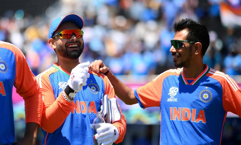 <span>Rishabh Pant (left) and Yuzvendra Chahal share a joke during their warm-up for the T20 World Cup.</span><span>Photograph: Alex Davidson/ICC/Getty Images</span>