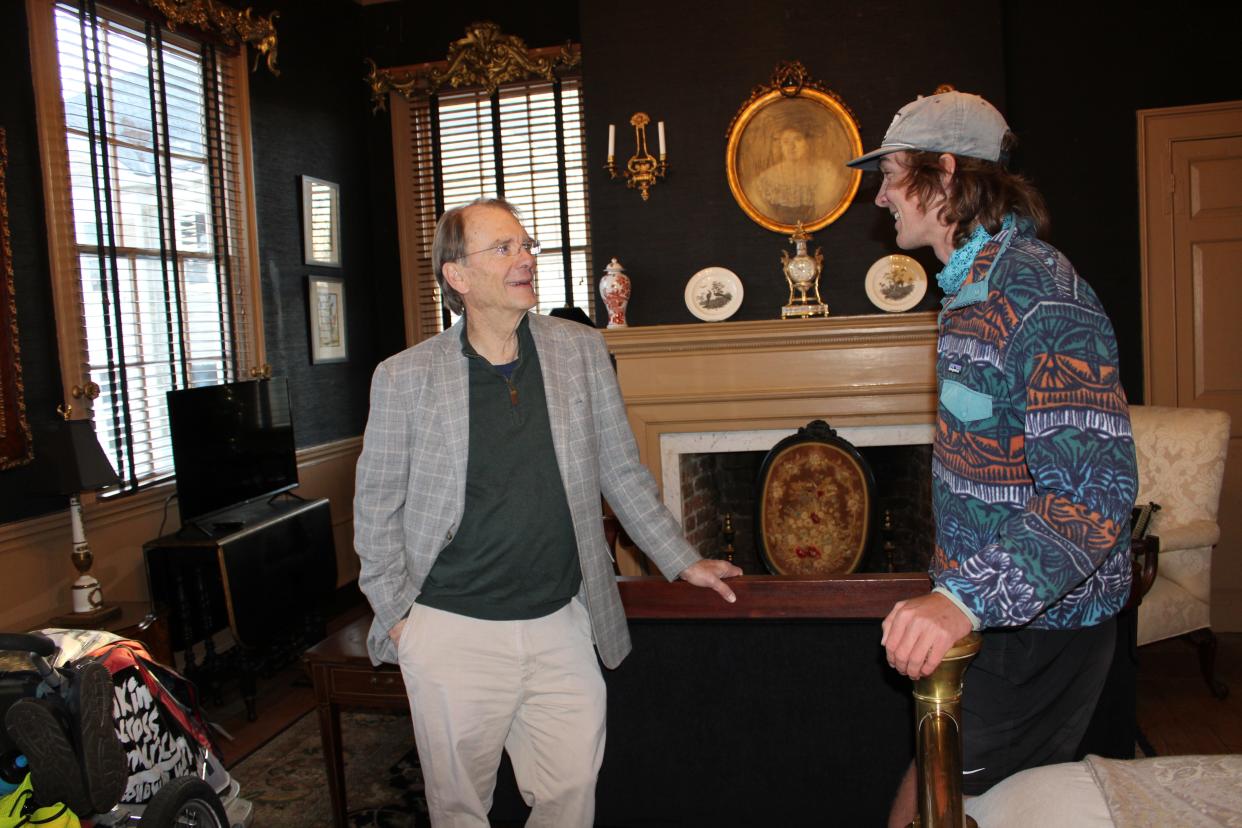 On the right, Holden Minor Ringer chats with Dale Pittman in Strawberry Hill's Barksdale Suite. The historic inn in Petersburg is owned by Pittman and his wife Linda. Ringer's overnight stay during his walk across America was sponsored by the Pittman's and Bill Nicholson.