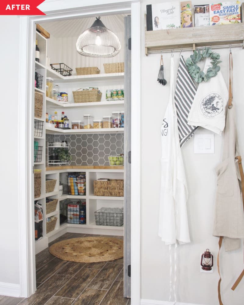 After: Pantry with wood shelving, baskets for goods, and a pendant light