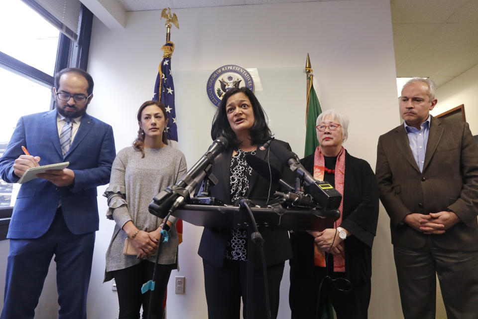 Rep. Pramila Jayapal, D-Wash., center, addresses a news conference as she stands with Masih Fouladi, left, Negah Hekmati, Diane Narasaki and Jorge Baron and talks about Hekmati's hours-long delay returning to the U.S. from Canada with her family days earlier, Monday, Jan. 6, 2020, in Seattle. Civil rights groups and lawmakers were demanding information from federal officials following reports that dozens of Iranian-Americans were held up and questioned at the border as they returned to the United States from Canada over the weekend. In a statement Sunday, the Washington state chapter of the Council on American-Islamic Relations said more than 60 Iranians and Iranian-Americans were detained and questioned at the Peace Arch Border Crossing in Blaine, Washington. (AP Photo/Elaine Thompson)