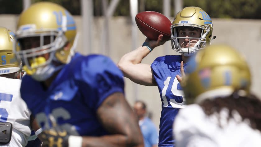 LOS ANGELES, CALIF. - APR. 21, 2018. UCLA quarterback Matt Lynch (15) throws downfield during the B