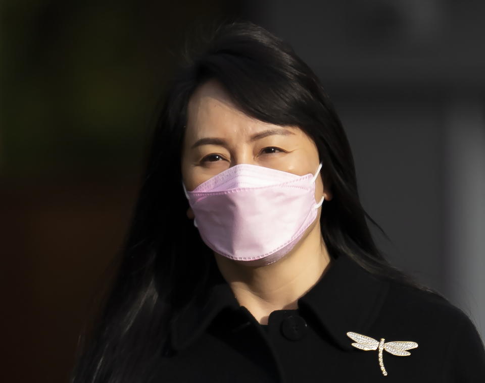 Chief Financial Officer of Huawei, Meng Wanzhou leaves her home in Vancouver, Wednesday, March 17, 2021. (Jonathan Hayward/The Canadian Press via AP)