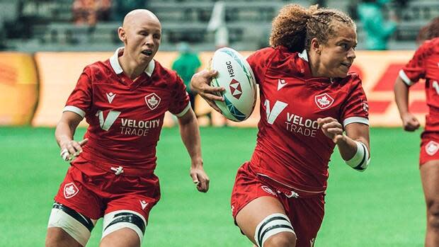 Renee Gonzalez, right, scored a pair of tries to help Canada to a 26-26 tie against the United States in women's rugby sevens action on Saturday in Edmonton. Olivia Apps, left, converted Sabrina Poulin's try that pulled the Canadians even. (Submitted by Jordan Leigh/Rugby Canada - image credit)