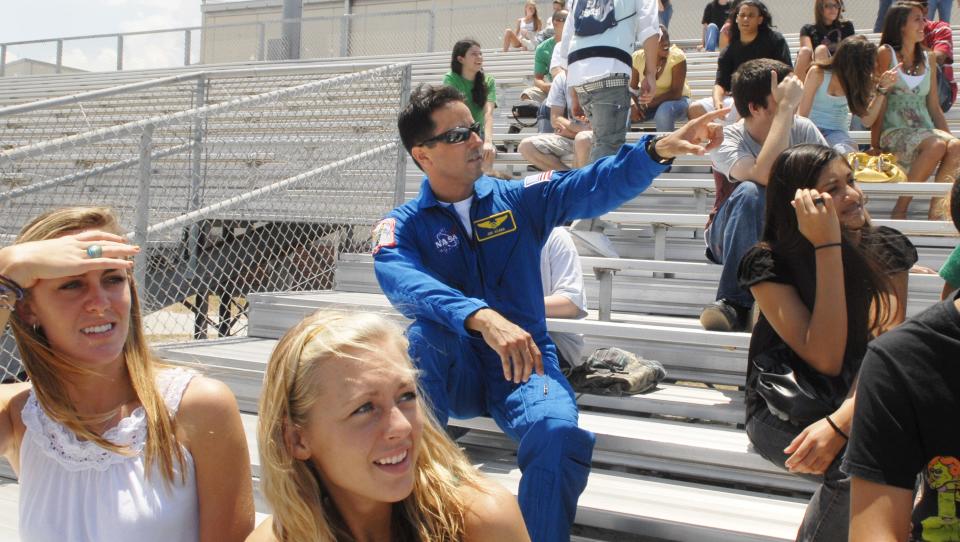In May 2009, NASA astronaut Joe Acaba joined Melbourne High School students who gathered at the school stadium to watch the shuttle Atlantis lift off from Kennedy Space Center on the final servicing mission to the Hubble Space Telescope. Acaba, who taught science at Mel-Hi in 1999-2000, flew on Discovery's STS-119 mission and two other missions aboard Russian Soyuz capsules to the International Space Station. He has now been appointed as chief of NASA's Astronaut Office at Johnson Space Center in Texas. (Photo: Tim Shortt, FLORIDA TODAY)