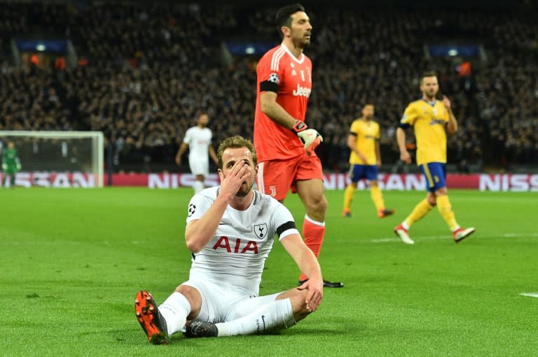 Tottenham's Harry Kane holds his head in his hands after a chance goes begging against Juventus