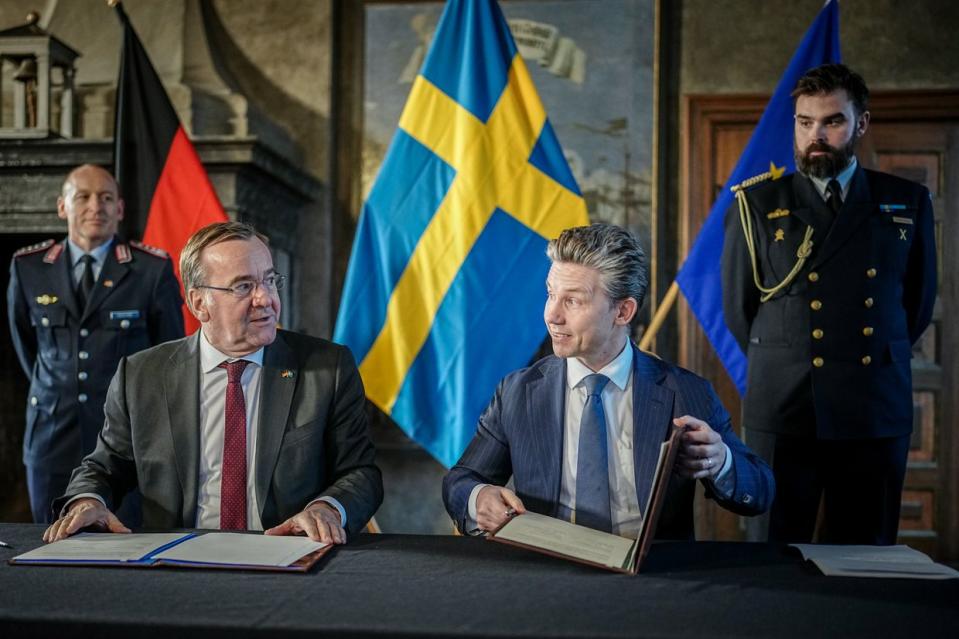 German Defense Minister Boris Pistorius and his Swedish counterpart Pal Jonson sign a memorandum of understanding on March 5, 2024, at Karlberg Castle in Stockholm, Sweden. (Kay Nietfeld/picture alliance via Getty Images)