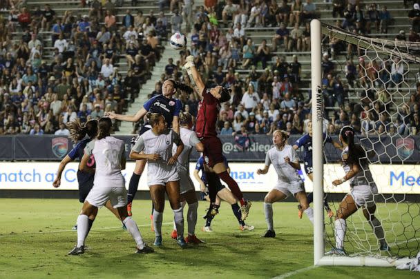 PHOTO: Kaylie Collins #18 of Orlando Pride jumps to defend the goal in the first half against San Diego Wave FC at Torero Stadium, Aug. 13, 2022, in San Diego. (Joe Scarnici/Getty Images)