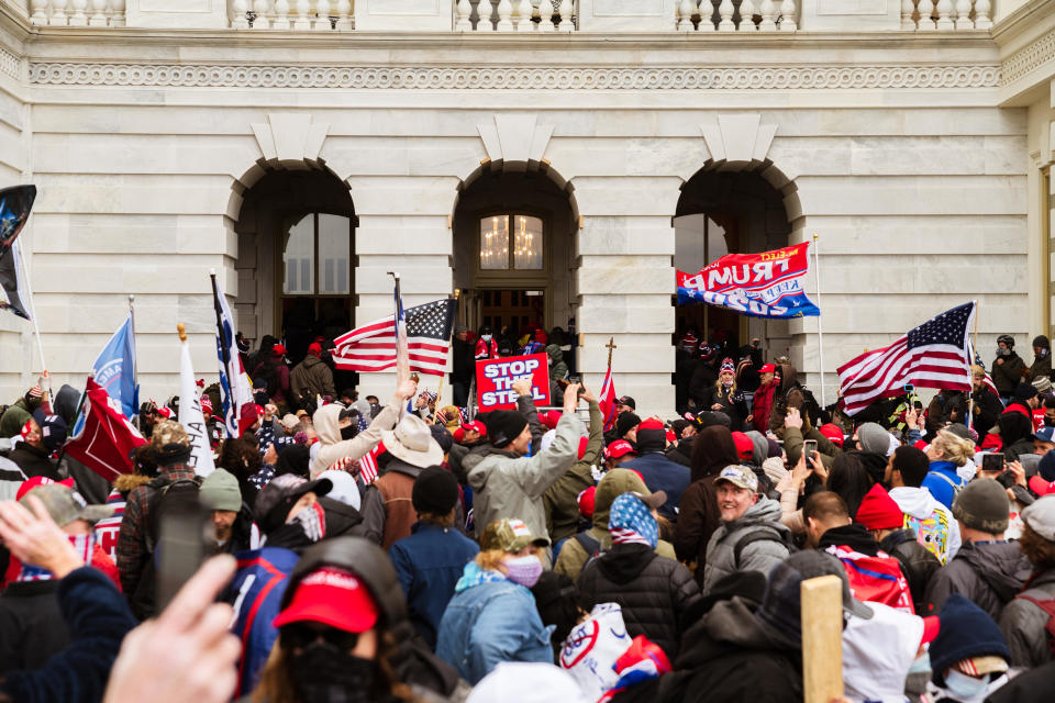 A pro-Trump mob floods into the Capitol Building after breaking into it on January 6, 2021, in Washington, D.C.  / Credit: Getty Images