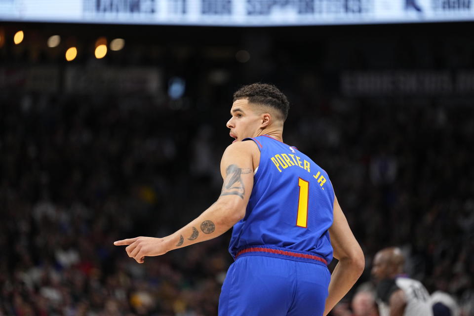 Denver Nuggets forward Michael Porter Jr. celebrates a 3-point basket against the Chicago Bulls during the second quarter of an NBA basketball game, Saturday, Nov. 4, 2023, in Denver. (AP Photo/Jack Dempsey)