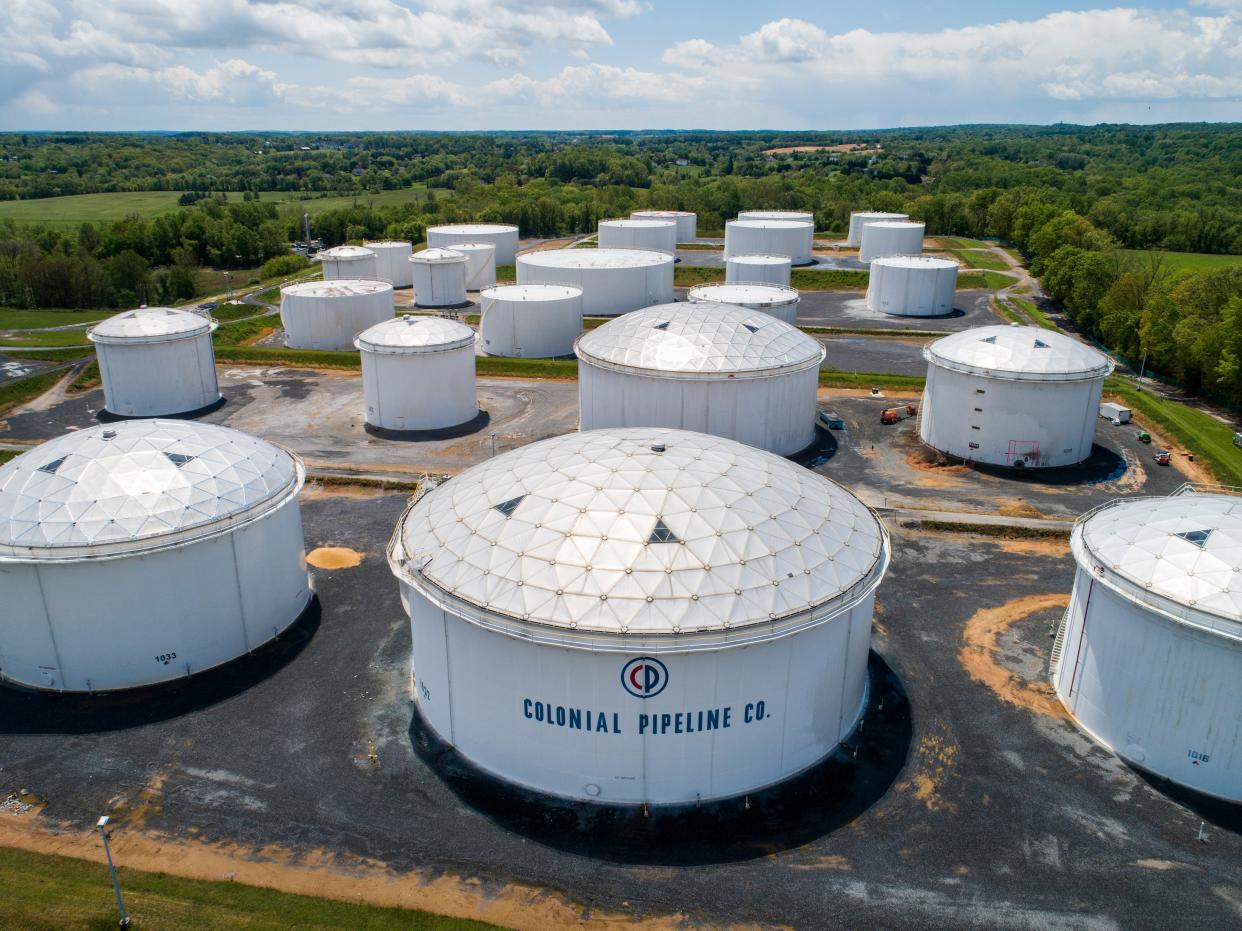 <p>Fuel tanks at a Colonial Pipeline breakout station in Woodbine, Maryland</p> (EPA)