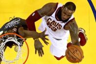 June 3, 2018; Oakland, CA, USA; Cleveland Cavaliers forward LeBron James (23) shoots the ball against Golden State Warriors forward Draymond Green (23) in game two of the 2018 NBA Finals at Oracle Arena. Mandatory Credit: Ezra Shaw/pool photo via USA TODAY Sports