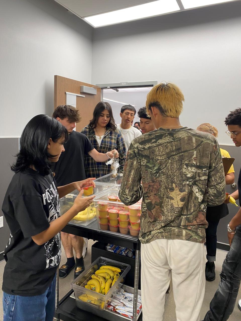 Pueblo East High School students select items from a breakfast cart, including student-crafted oat energy bites, on April 25, 2024.