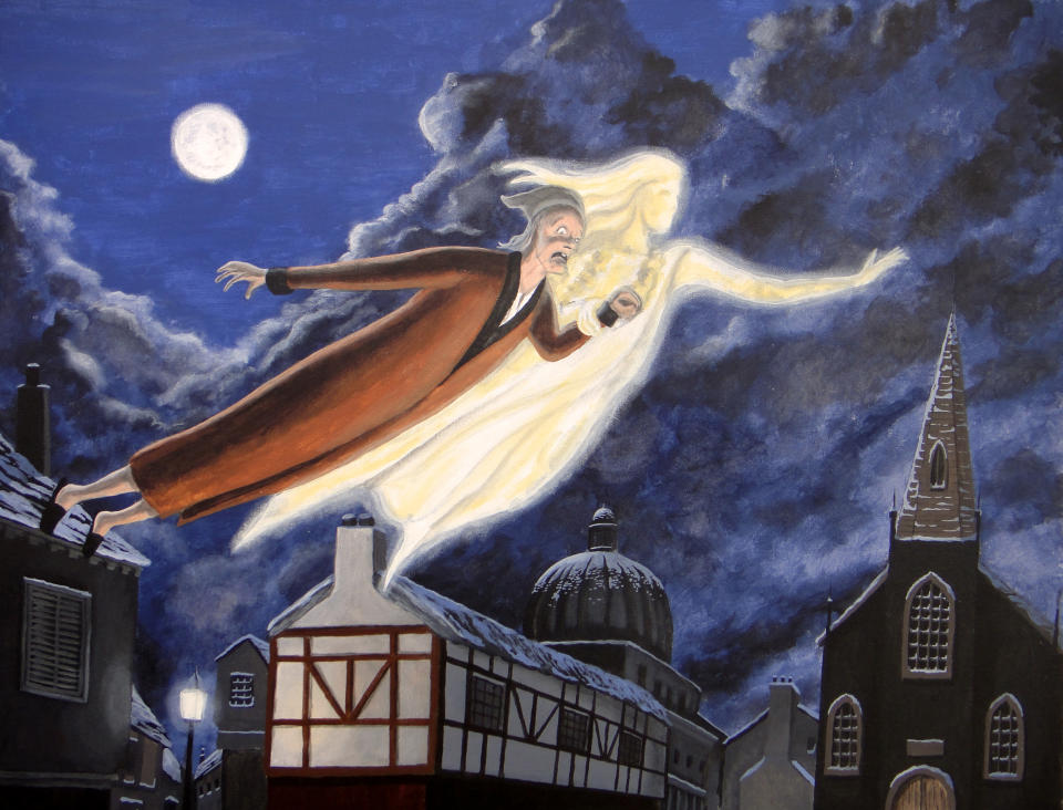 Scrooge and the Ghost of Christmas Past fly over the town