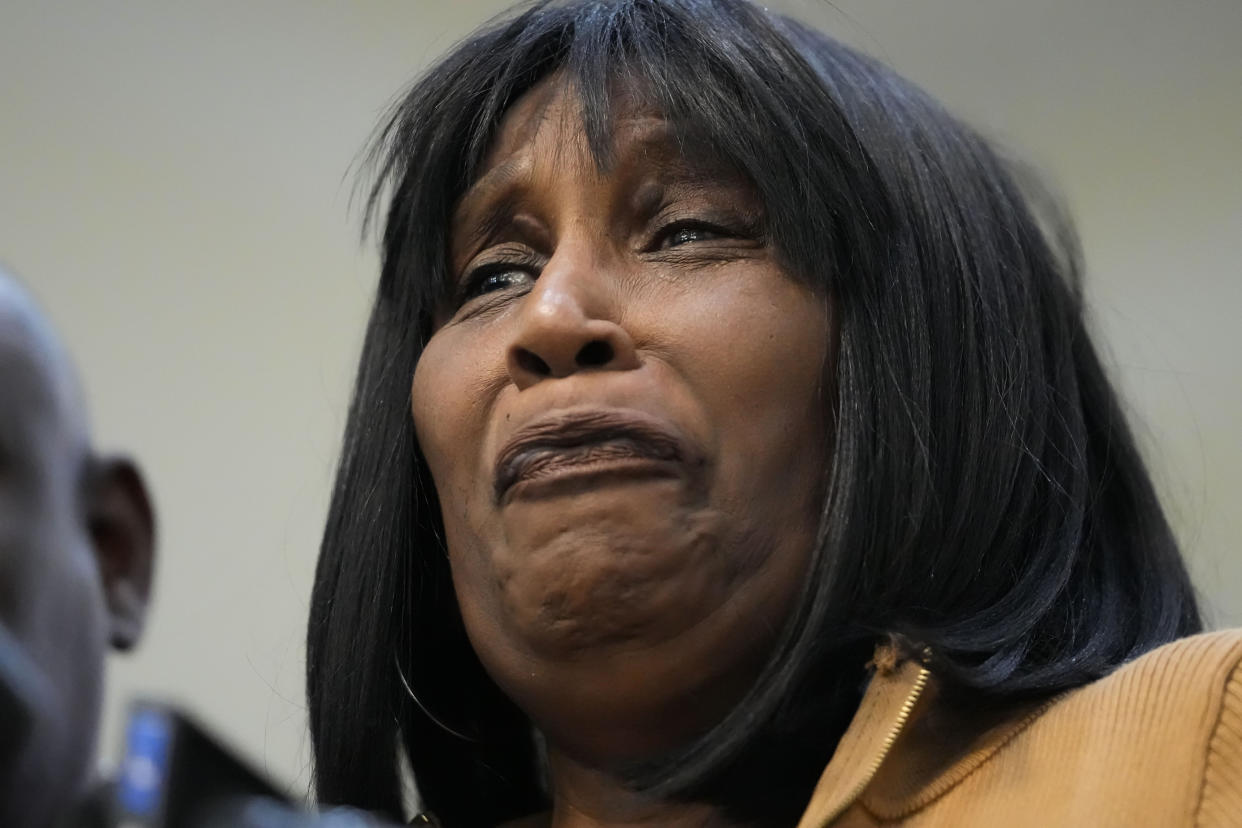 RowVaughn Wells, mother of Tyre Nichols, who died after being beaten by Memphis police officers, reacts at a news conference with civil rights Attorney Ben Crump in Memphis, Tenn., Friday, Jan. 27, 2023. (AP Photo/Gerald Herbert)