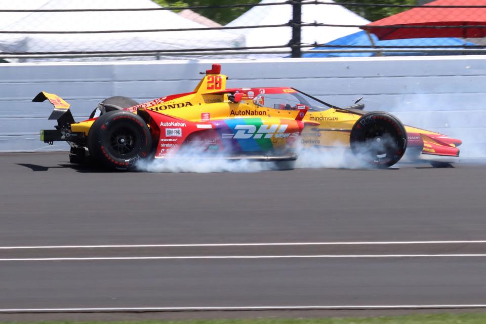 Andretti Autosport driver Romain Grosjean (28) crashes in the second turn Sunday, May 29, 2022, during the 106th running of the Indianapolis 500 at Indianapolis Motor Speedway