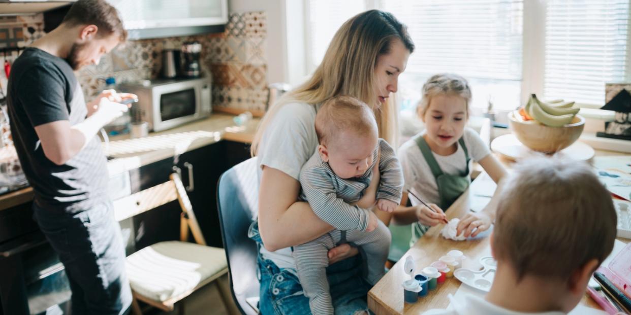 mother doing crafts in kitchen with kids patriarchal motherhood