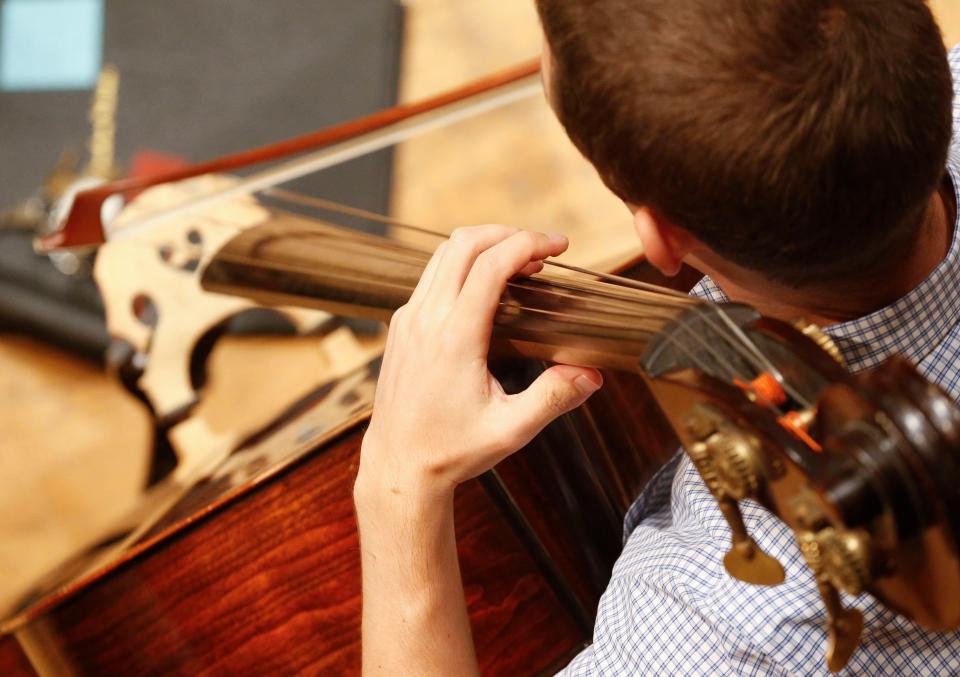 Members of the Tuscaloosa Symphony Orchestra play during rehearsal Sunday, Sept. 16, 2018 in Moody Music Hall at the University of Alabama. [Staff Photo/Gary Cosby Jr.]