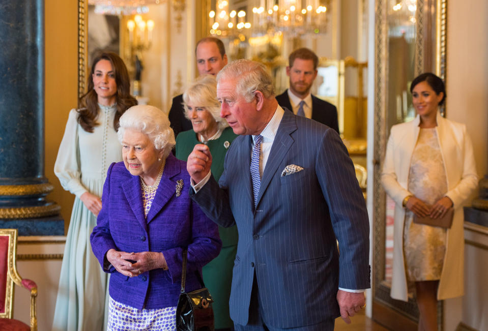 File photo dated 05/03/19 of the Duke and Duchess of Sussex joining Queen Elizabeth II and the Prince of Wales, followed by the Duke and Duchess of Cambridge and the Duchess of Cornwall, at a reception at Buckingham Palace in London to mark the fiftieth anniversary of the investiture of the Prince of Wales, as the PA news agency looks back on the royal couple's year.