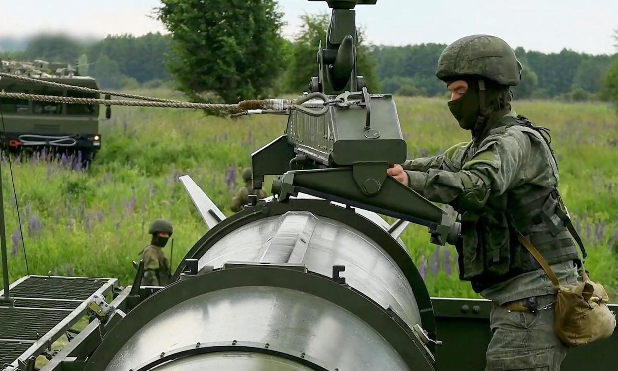 <span>A Russian soldier operates a non-strategic nuclear missile during drills on the border of Russia and Belarus.</span><span>Photograph: Russian Defence Ministry Press S Handout/EPA</span>