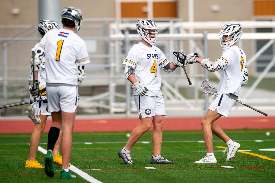 PSD's Ethan Hough celebrates after scoring a goal during a Colorado Class 5A boys first-round lacrosse match on Wednesday at PSD Stadium in Timnath.