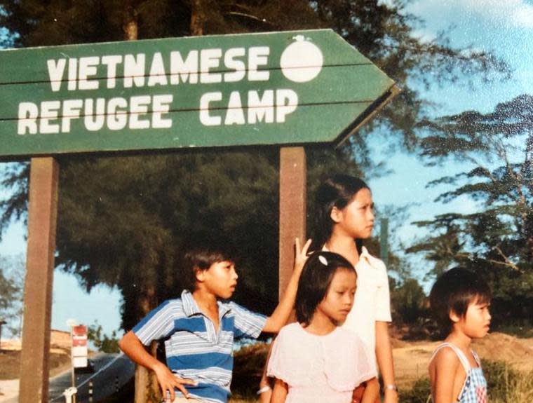 12-year-old Cristal Lim, née Tran (middle) with her three siblings at the former Vietnamese refugee camp in Hawkins Road, Sembawang, in 1981.   PHOTO: Cristal Lim 