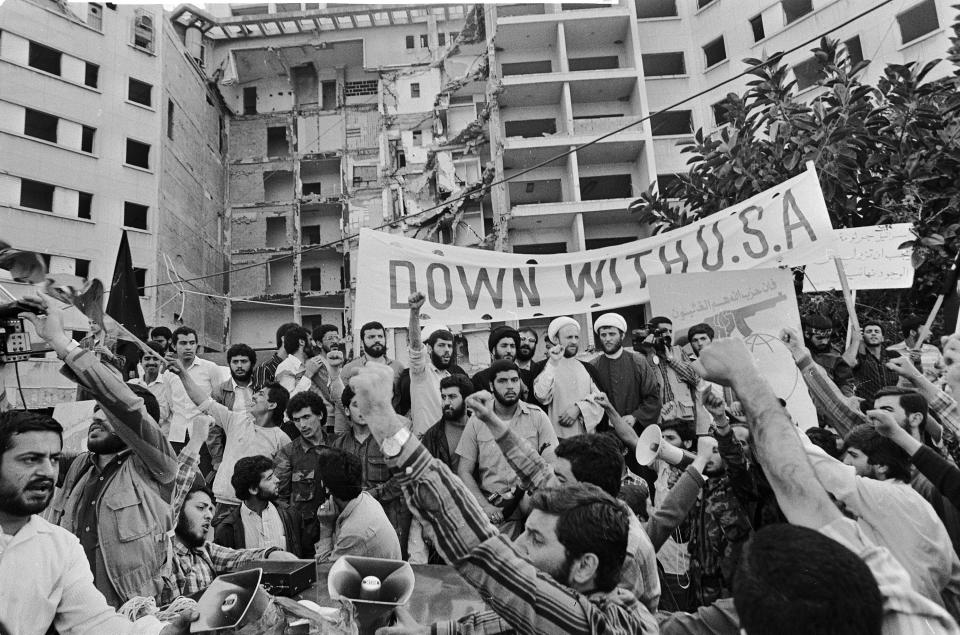 FILE - Shiite Muslim Sheikhs address supporters of Hezbollah, or party of God, in a demonstration outside the bombed U.S. Embassy in West Beirut, Lebanon, April 16, 1986. Forty years since it was founded, Lebanon's Hezbollah has transformed from a ragtag organization to the largest and most heavily armed militant group in the Middle East. (AP Photo, File)