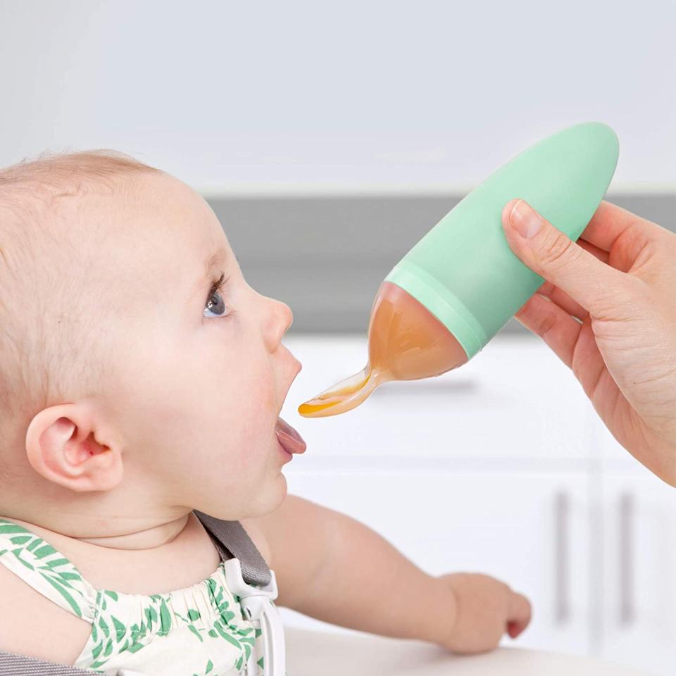 The squeezable silicone pouch in the handle of this spoon will make feeding pureed meals cleaner and easier than ever. Plus, this comes with a hard plastic lid so you can seal it up and save it for snack time.<br /><br /><strong>Promising review:</strong> "This product is amazing!!! I now have kids in sports/activities and I am always on the go. <strong>I put my baby's food in one of these and take it to go in my diaper bag.</strong> It comes with a spoon cover that is hard plastic that covers the hole where the food comes out. The body of the spoon is a soft silicone that you gently squeeze to get the pureed food out. The spoon itself is a hard plastic but we had no issues. It is easy to clean and comes apart in two pieces. Seriously, this is the best gadget ever! This is coming from a mother of four who has probably owned and purchased every gadget out there to make life easier!!" &mdash; <a href="https://www.amazon.com/dp/B00A475DRO?tag=huffpost-bfsyndication-20&amp;amp;ascsubtag=5871416%2C21%2C27%2Cd%2C0%2C0%2C0%2C962%3A1%3B901%3A2%3B900%3A2%3B974%3A3%3B975%3A2%3B982%3A2%2C16386619%2C0" target="_blank" rel="noopener noreferrer">castgirl</a>﻿<br /><strong><br />Get it from Amazon for <a href="https://www.amazon.com/dp/B00A475DRO?tag=huffpost-bfsyndication-20&amp;amp;ascsubtag=5871416%2C21%2C27%2Cd%2C0%2C0%2C0%2C962%3A1%3B901%3A2%3B900%3A2%3B974%3A3%3B975%3A2%3B982%3A2%2C16386619%2C0" target="_blank" rel="noopener noreferrer">$8.35+</a> (available in two colors).</strong>