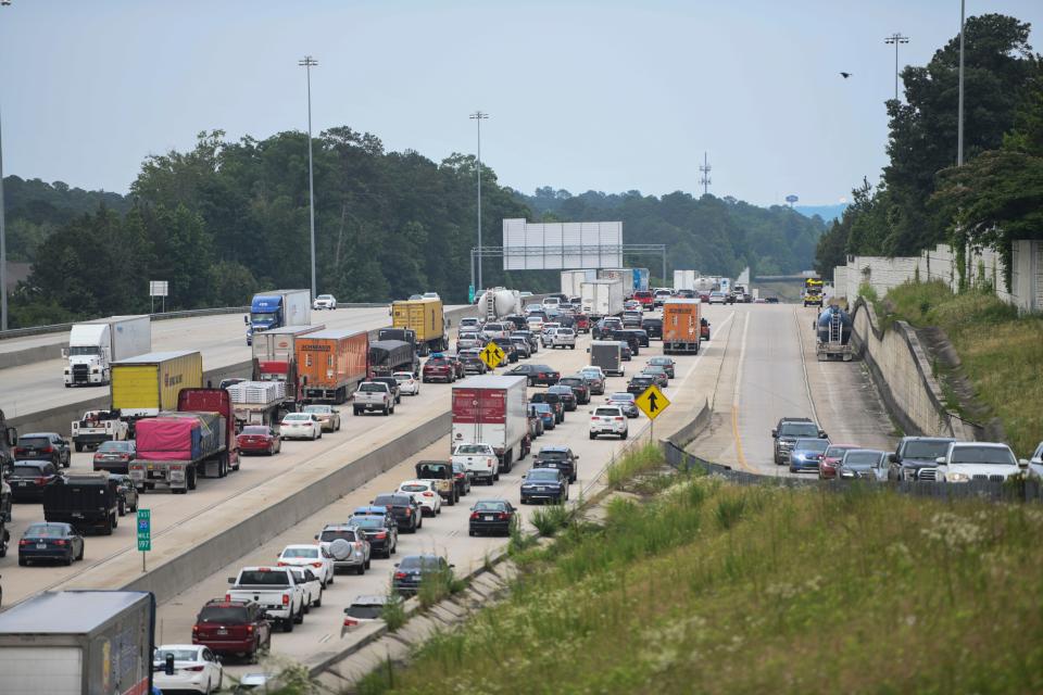 FILE - Traffic sits at a standstill on I-20 in Augusta on Monday, May 22, 2023. Heavy traffic buildup is expected around Thanksgiving, especially the Wednesday before.