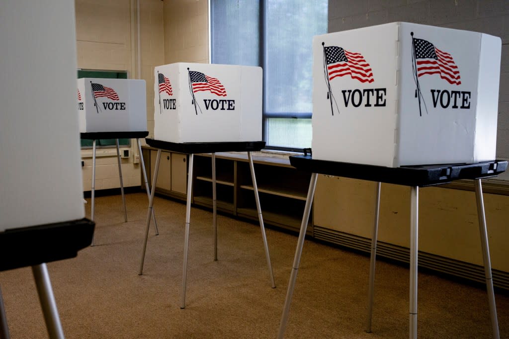 Voting booths at a polling station in Lansing, Mich., Aug. 1. Bloomberg via Getty Images