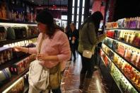 Shoppers browse the aisles of the Victoria's Secret flagship store in New York, November 19, 2012. REUTERS/Brendan McDermid