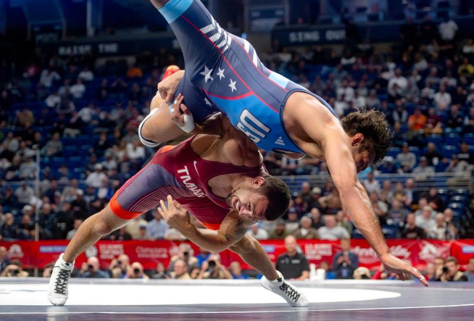 Aaron Brooks takes down Zahid Valencia in the 86 kg championship bout during the U.S. Olympic Team Trials at the Bryce Jordan Center on Friday, April 19, 2024.