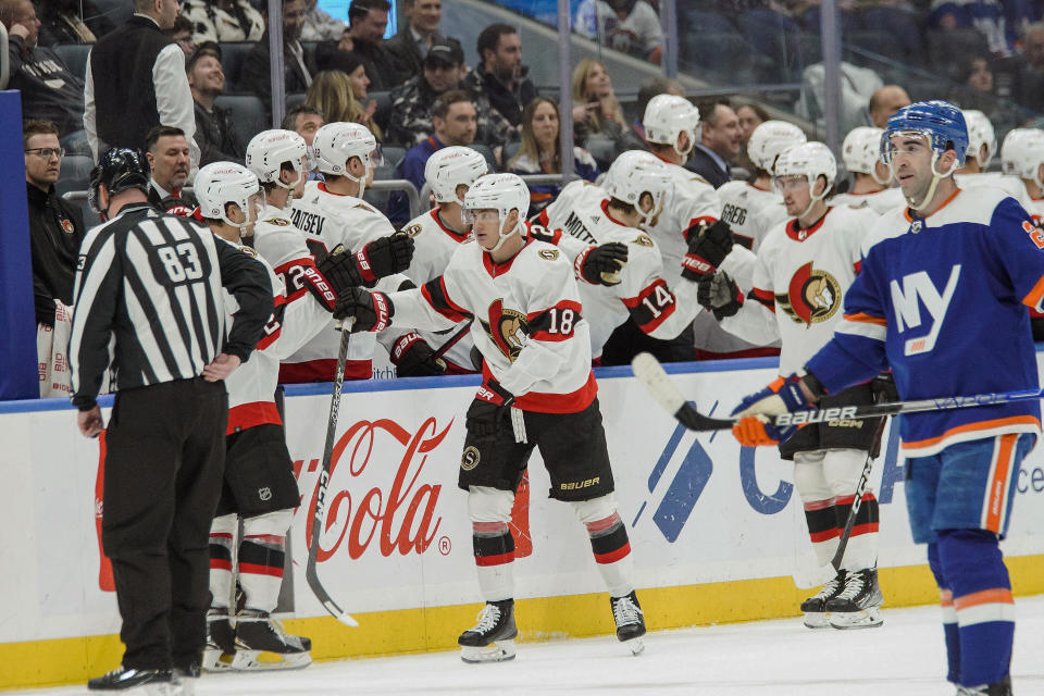 Ottawa Senators players celebrate a goal against the New York Islanders during the second period of an NHL hockey game Tuesday, Feb. 14, 2023, in Elmont, N.Y. (AP Photo/Eduardo Munoz Alvarez)
