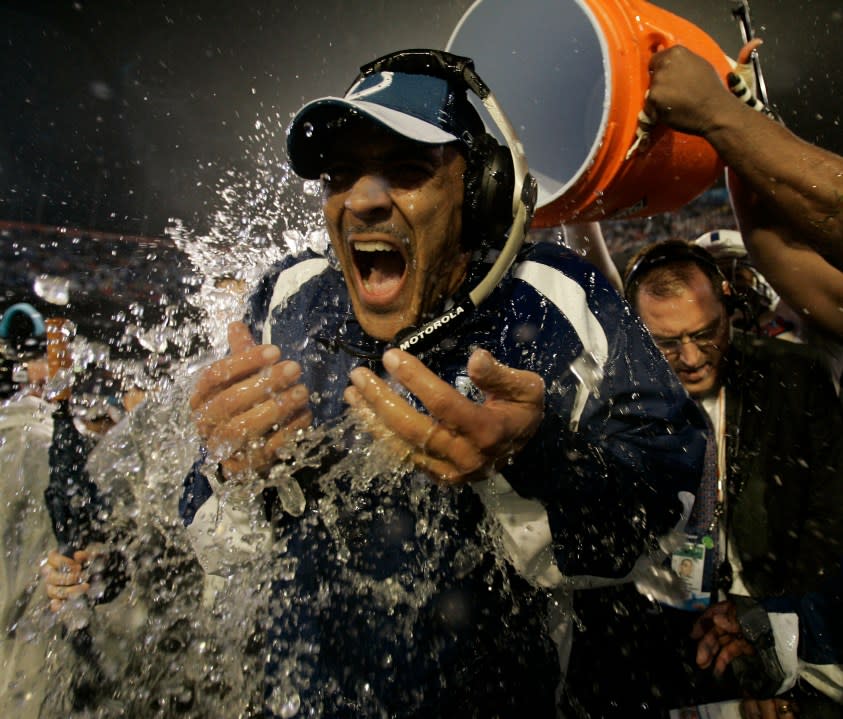 FILE – In this Feb. 4, 2007, file photo, Indianapolis Colts coach Tony Dungy is dunked after the Colts defeated the Chicago Bears, 29-17, in the Super Bowl XLI football game at Dolphin Stadium in Miami. The soft-spoken Dungy, who will be inducted into the Pro Football Hall of Fame on Saturday, Aug. 6, 2016. (AP Photo/David J. Phillip, File)