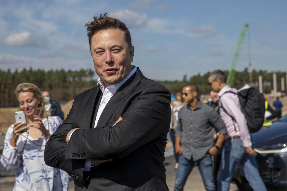 GRUENHEIDE, GERMANY - SEPTEMBER 03: Tesla head Elon Musk talks to the press as he arrives to to have a look at the construction site of the new Tesla Gigafactory near Berlin on September 03, 2020 near Gruenheide, Germany. Musk is currently in Germany where he met with vaccine maker CureVac on Tuesday, with which Tesla has a cooperation to build devices for producing RNA vaccines, as well as German Economy Minister Peter Altmaier yesterday. (Photo by Maja Hitij/Getty Images)