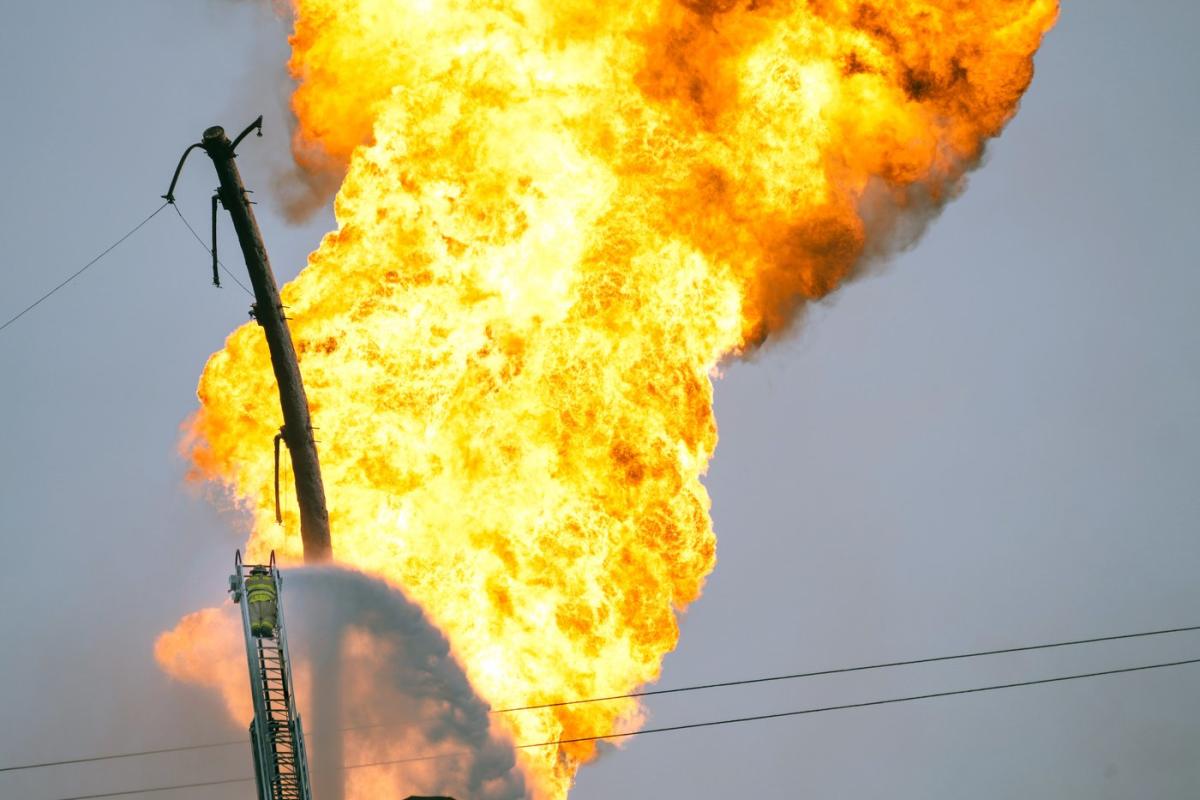 Flame from furious pipeline fire near Houston subsides but continues burning