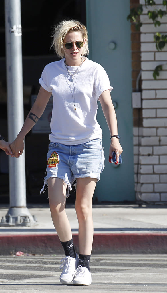 <p>The former <em>Twilight</em> star went the extra inch in a decorated pair of denim cutoffs on a July 2016 lunch date with ex-girlfriend Alicia Cargile in L.A. (Photo: Splash News) </p>
