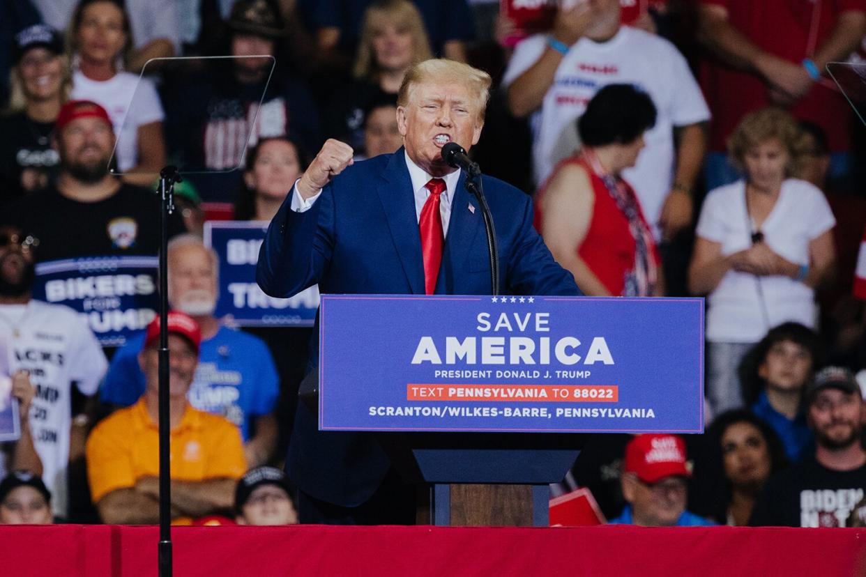 Former US President Donald Trump gestures as he speaks during a rally in Wilkes-Barre, Pennsylvania, US, on Saturday, Sept. 3, 2022. Trump used a Pennsylvania rally to vent his anger at an FBI search of his Florida home and President Joe Bidens attack on political extremism, staking his claim as his successors election rival in 2024.